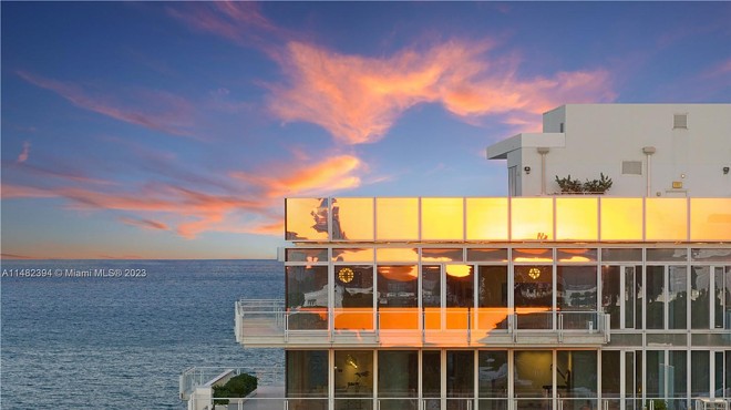 An expansive luxury condo overlooking the ocean in Surfside, Florida.