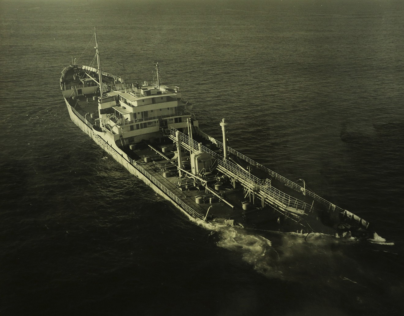 The aftermath of the collision shows the floating wreckage of the Stolt Dagali.
