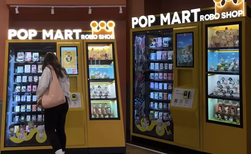 Image: Screenshots of recent videos posted online of people buying items from the yellow vending machine inside Dolphin Mall.