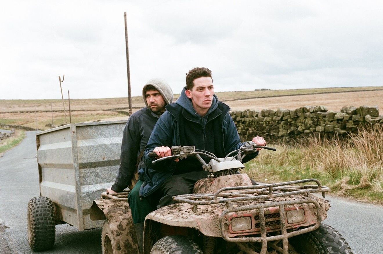 Josh O’Connor (right) plays raw-eyed farm boy Johnny and Alec Secareanu is Gheorghe, a strapping yet tender Romanian, two characters who try a little tenderness in the rough hills of northern England in Francis Lee’s stark, striking God’s Own Country.