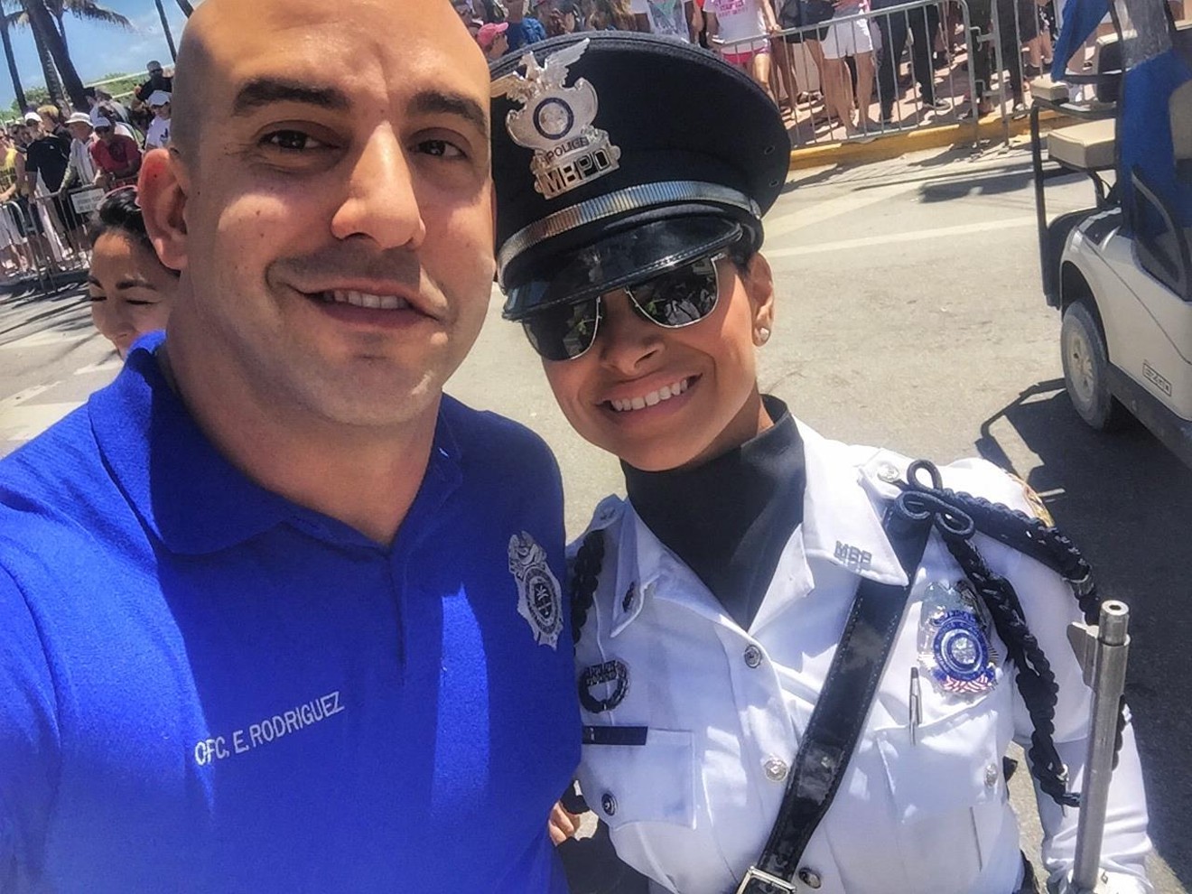 Miami Beach Police spokesperson Ernesto Rodriguez (left)