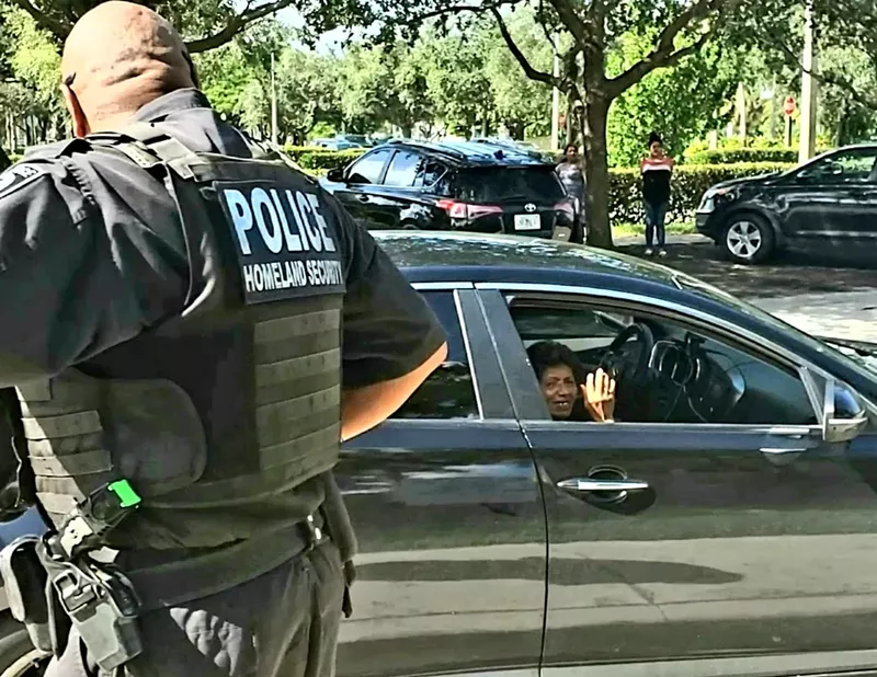 Image: Wednesday, agents with Homeland Security's Federal Protective Service stopped drivers of color outside ICE's Miami-area office.