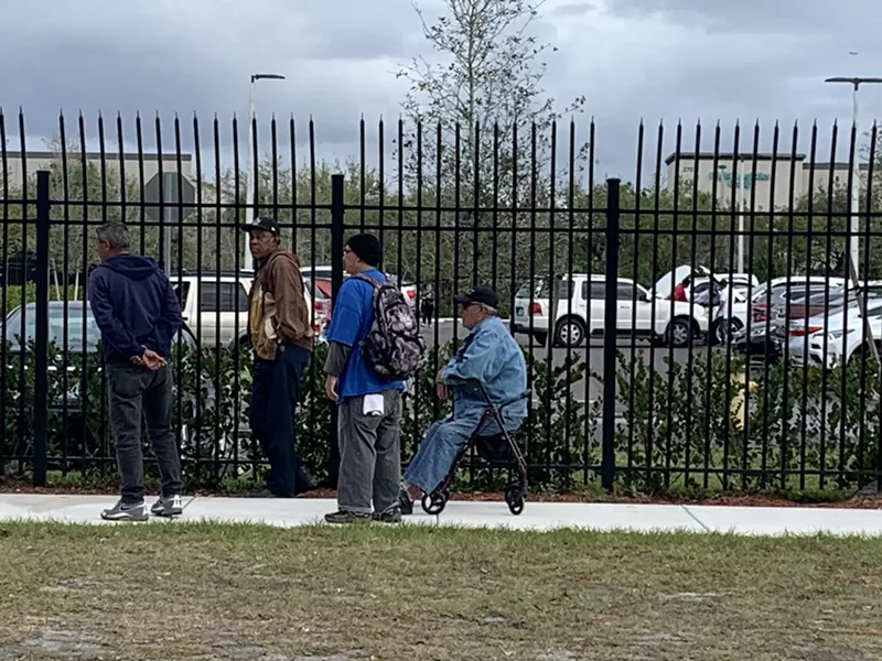 Image: Elderly immigrants forced to wait outside the ICE facility in Miramar could be exposed to coronavirus.