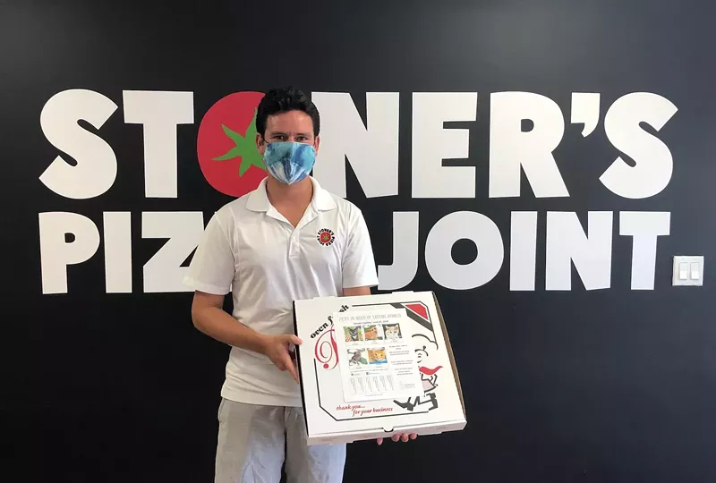 Image: Stoner's Pizza Joint Fort Lauderdale owner John Stetson is giving away a free year's worth of pizza to anyone who adopts a pet featured on his to-go boxes.