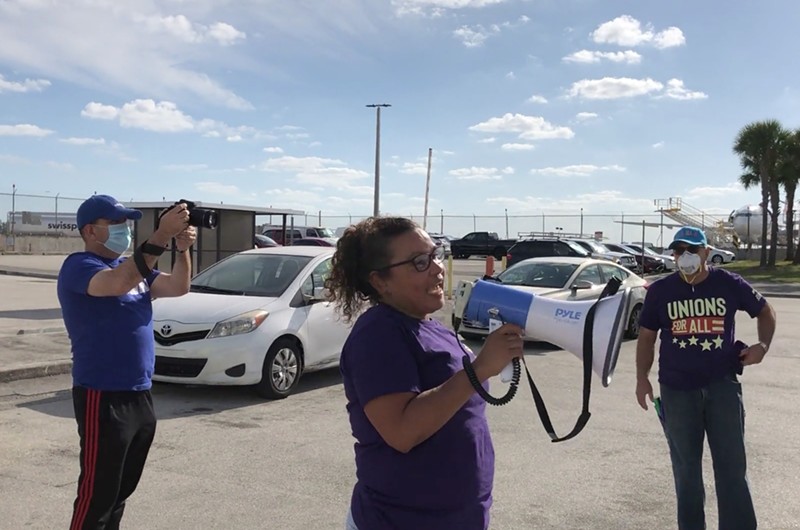 Eulen workers protest mass layoffs at MIA.