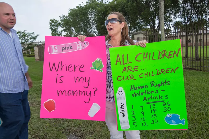 Image: Activists rally in Homestead to show their concern for children being held in facilities separate from their immigrant families.