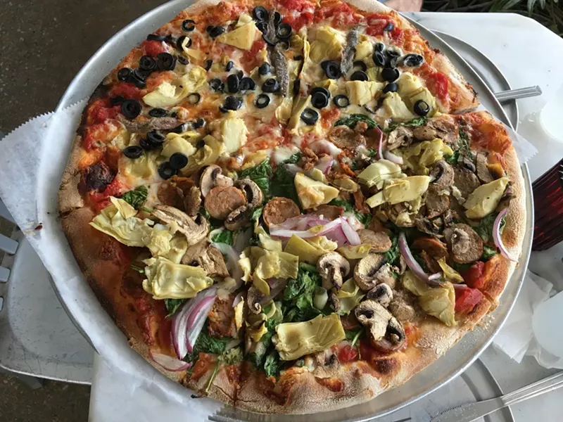 Image: Andiamo lets customers customize their own whole or half pizza.