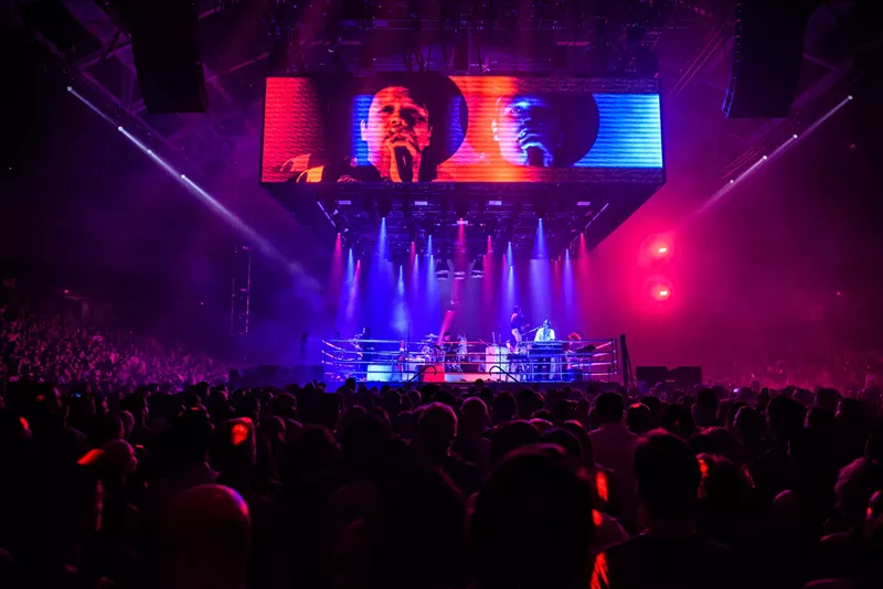Image: See more photos of Arcade Fire's show at the Watsco Center here.