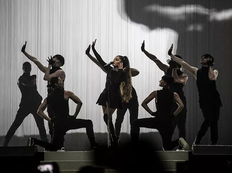 Image: Ariana Grande and her ponytail. See more photos from Ariana Grande at the American Airlines Arena here.