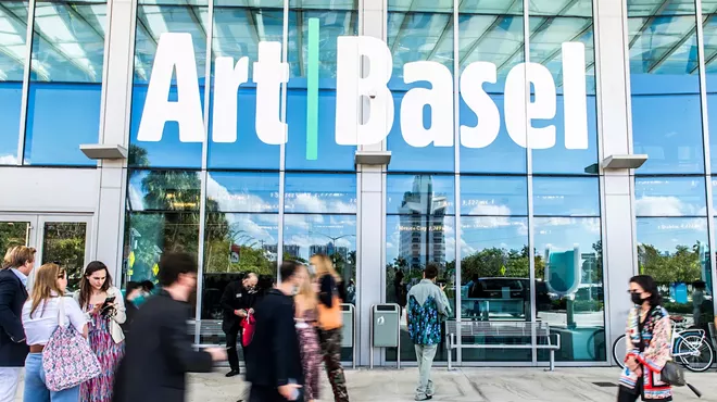 People standing outside the Miami Beach Convention Center during Art Basel 2021.