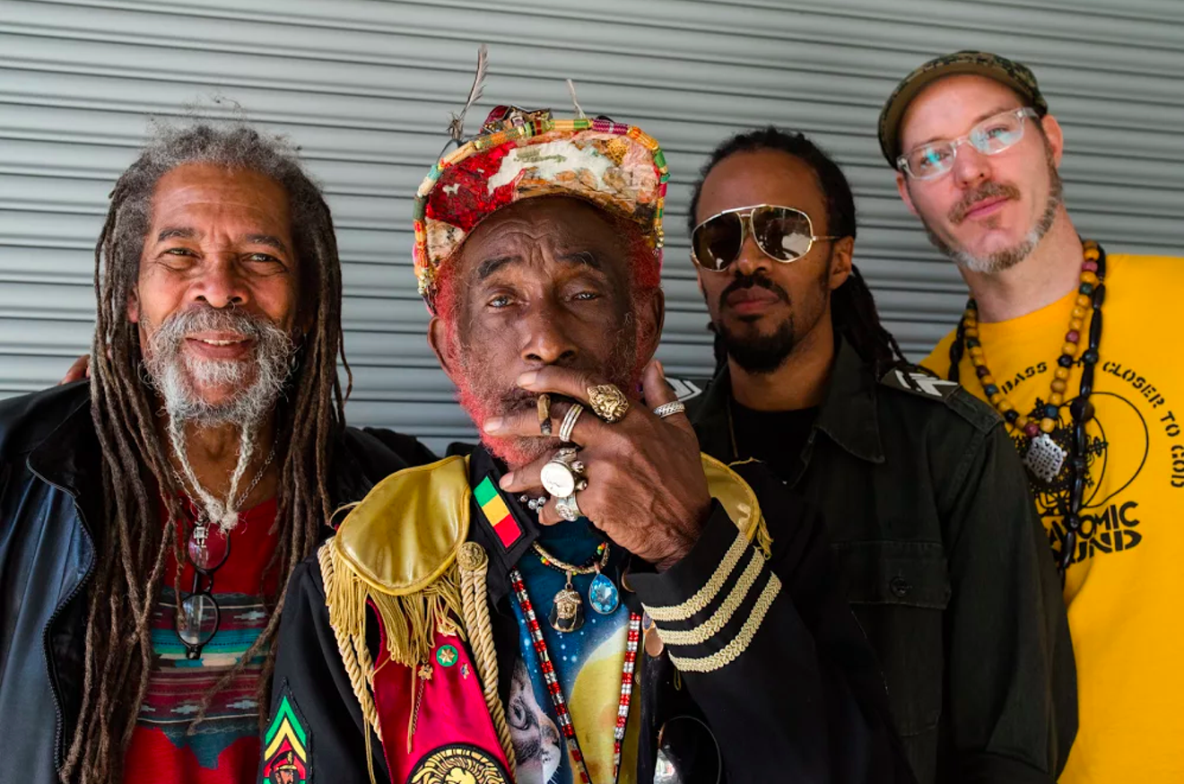 Lee “Scratch” Perry (center) and Subatomic Sound System