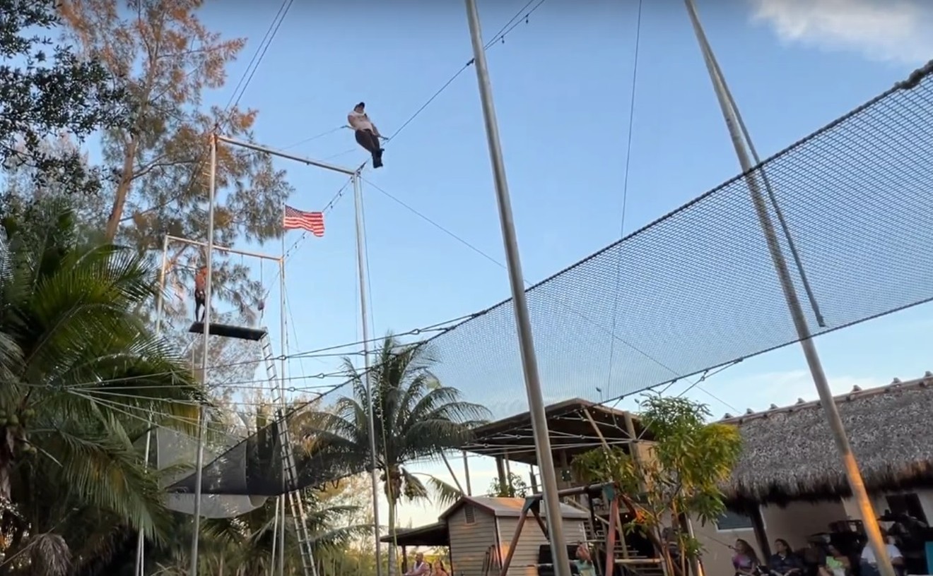 Backyard Trapeze Artist Battles Code Inspectors in Miami-Dade