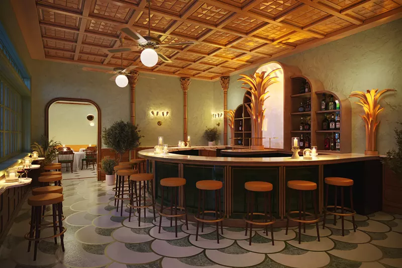 Image: A bar with chandeliers and dim lighting