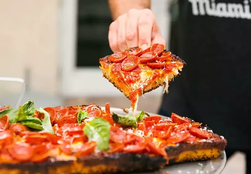 Image: The pepperoni hot honey Sicilian pie at Eleventh Street Pizza, one of the best restaurants in downtown Miami