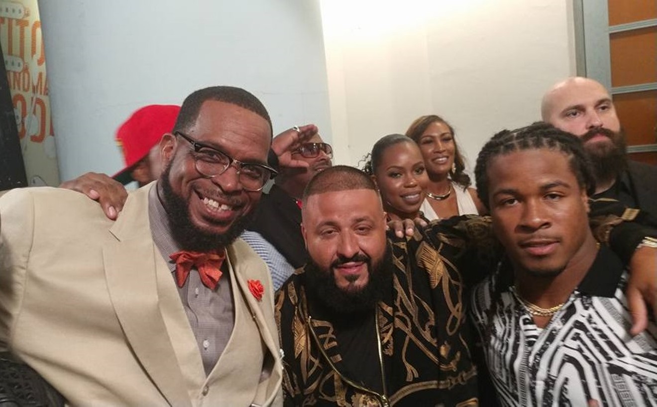 Luther Campbell, DJ Khaled, and Atlanta Falcons running back Devonta Freeman arrive at the 2017 BET Hip Hop Awards.