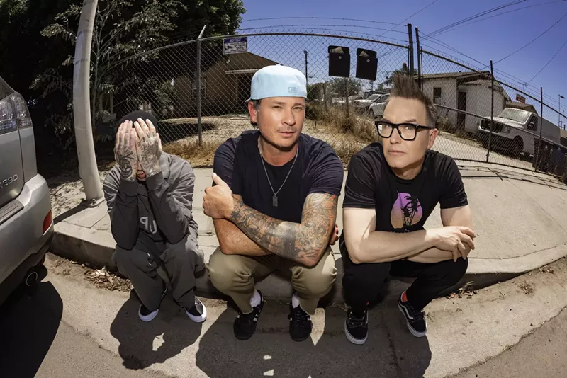 Image: Blink-182's original lineup — Travis Barker, Tom DeLonge, and Mark Hoppus — is back with new music and a massive tour.