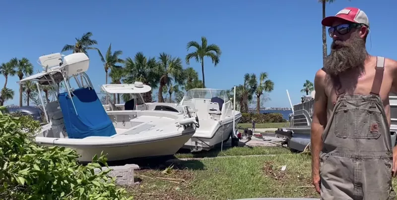 Image: Boat captain Court Douthit surveys damage in Iona, Florida after Hurricane Ian.