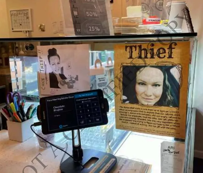 Image: An employee claims the posters were taken down but that the bakery still has memorabilia of the January 2023 mocha cake kerfuffle.