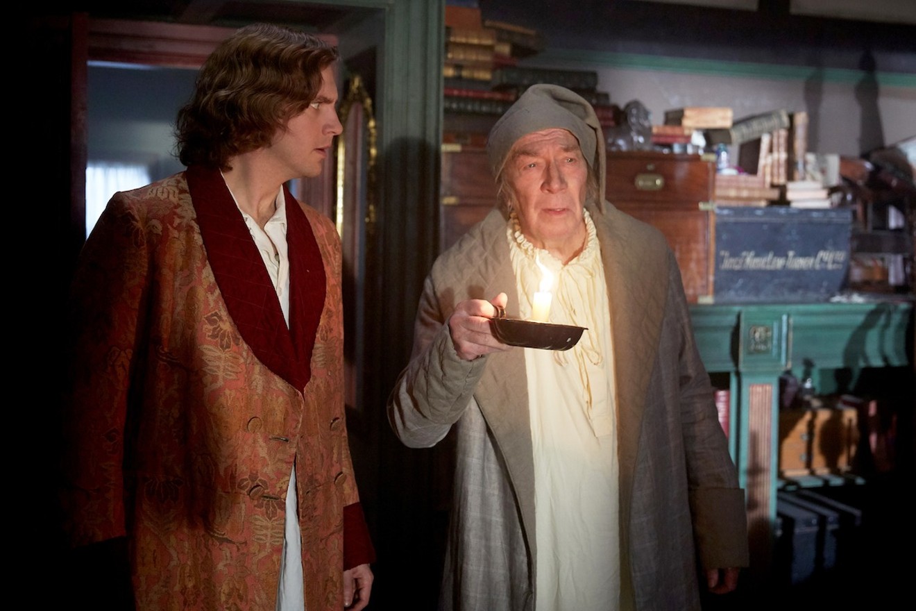 Dan Stevens (left) as Charles Dickens and Christopher Plummer as Ebenezer Scrooge in The Man Who Invented Christmas.