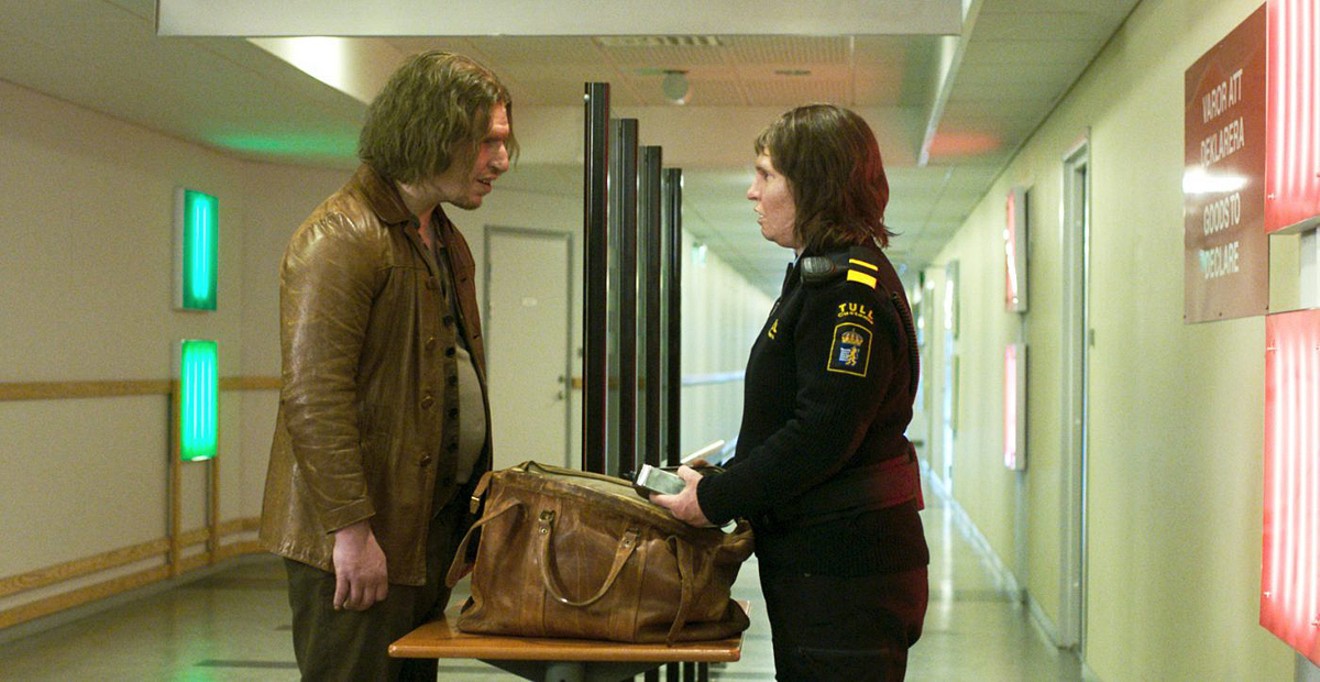 Eva Melander (right) plays Tina, a quiet, somber Swedish customs guard working a border crossing, and Eero Milonoff is Vore, who awakens her desires while proclaiming that humans are worthless parasites, in Ali Abbasi’s Border.