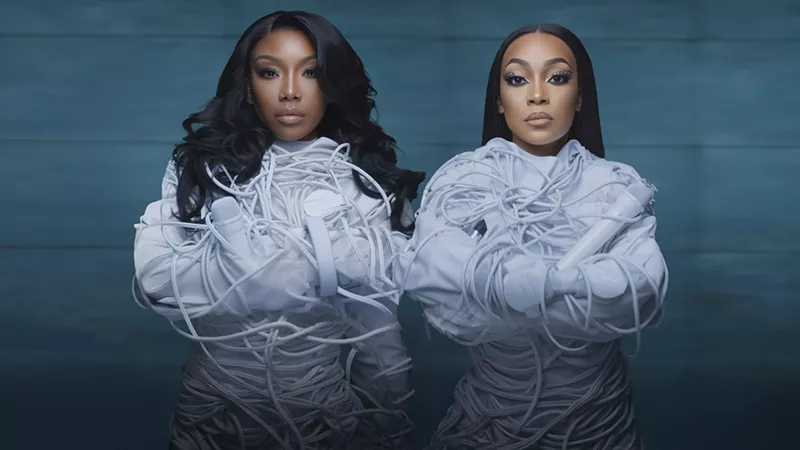 Image: Two women wearing straitjackets