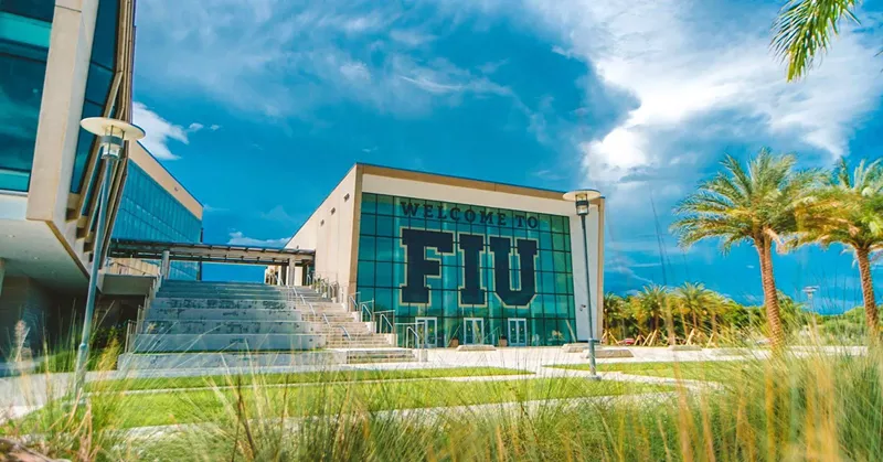 Image: Florida International University glass building with big FIU logo