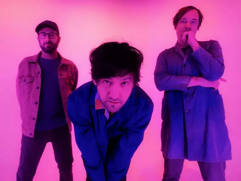 Image: Bright Eyes' Conor Oberst (center) hasn't been afraid to get political in his songs.