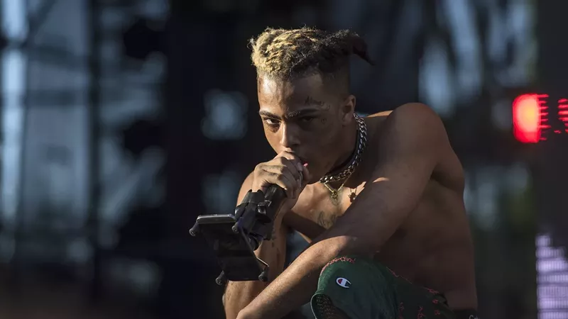 Image: XXXTentacion performs at Rolling Loud 2017.
