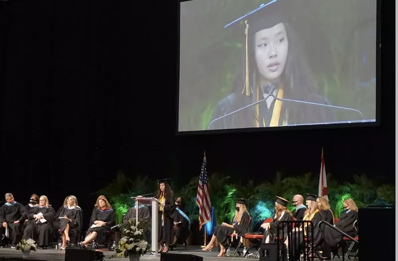 Image: Rachel Cheng delivers her salutatorian speech at the BB&T Center in Sunrise on June 8.