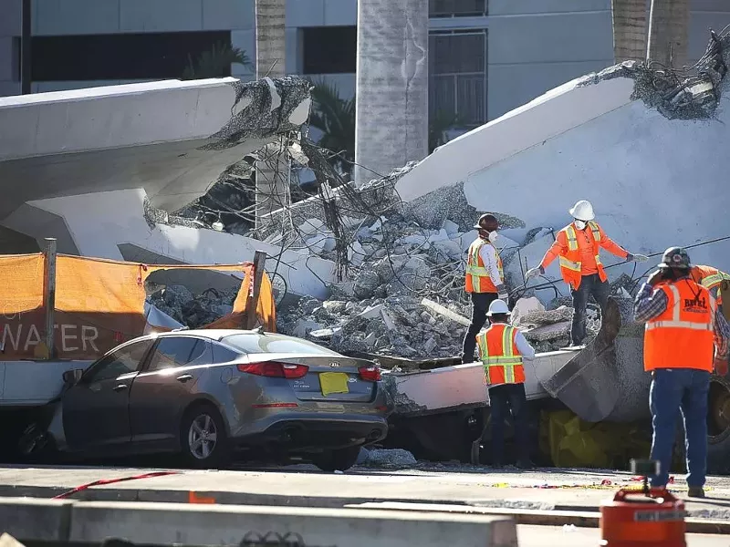 Image: FIU's new pedestrian bridge came crashing down in March 2018.
