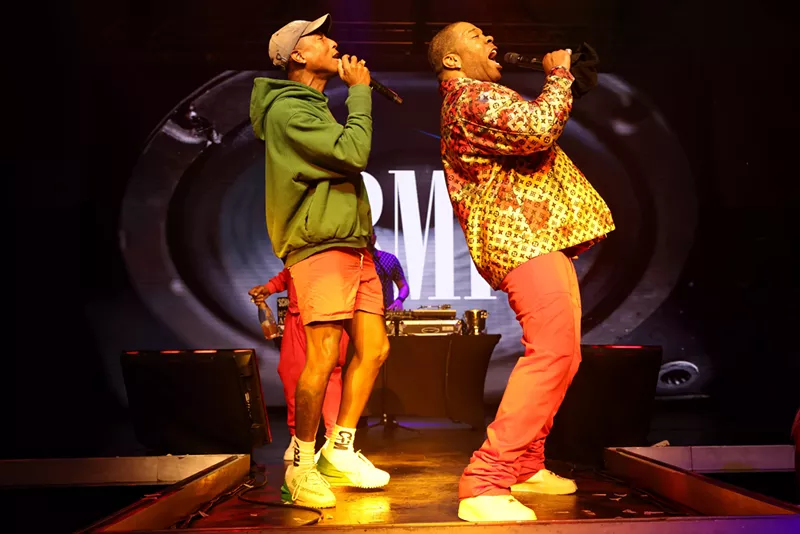 Image: Pharrell Williams and Busta Rhymes performed their smash hit "Pass the Courvoisier" at the 2022 BMI R&B/Hip-Hop Awards.