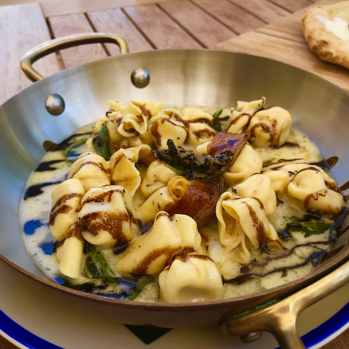 Fiocchetti alle pere e tarfuto: Handmade pasta filled with truffle cream and caramelized pear.