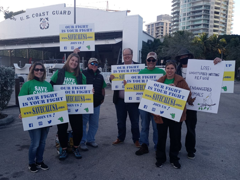 Image: Kendall residents and their attorney, David Winker (center right), protest outside a Bacardí event in Coconut Grove on January 29, 2022.