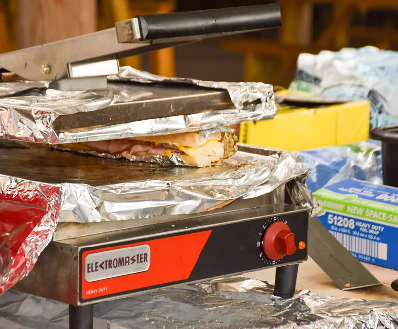 Image: Pressing the Tampa Cuban sandwich.