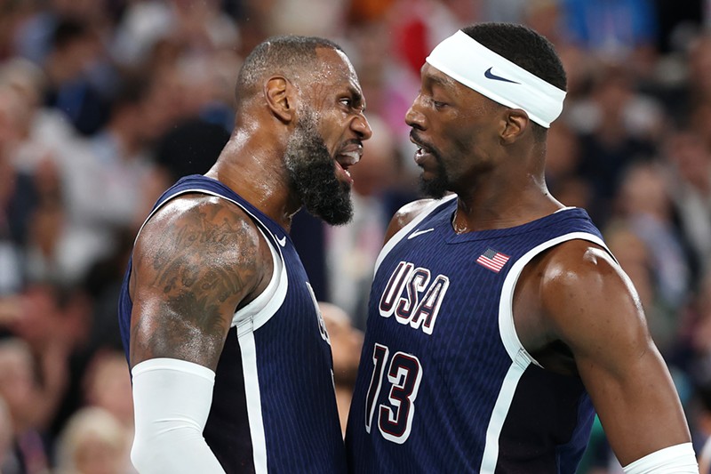 Lebron James celebrates with Bam Adebayo during the Paris Olympic Games men's basketball gold medal match between Team USA and Team France at Bercy Arena on August 10, 2024.