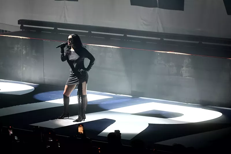 Image: Charli XCX performing on stage in London