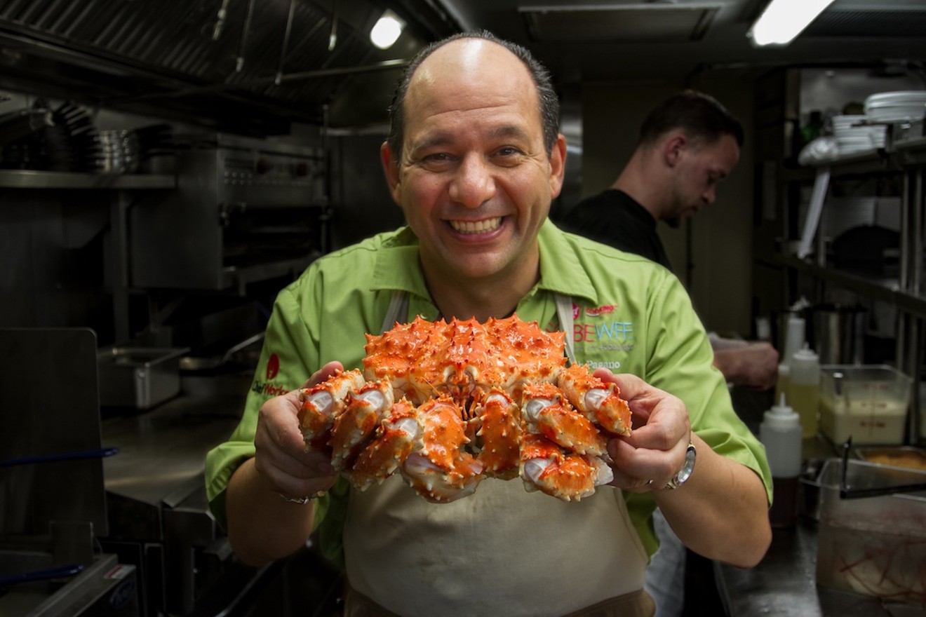 Naked Crab chef and owner Ralph Pagano displays his new restaurant's most prized item.