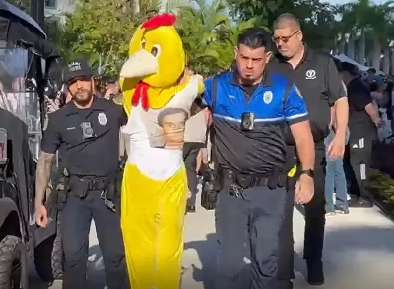 Image: Dressed in a chicken suit, Morgan Gianola was arrested on February 11, 2023, during a protest at the Dogs and Cats Walkway in downtown Miami.