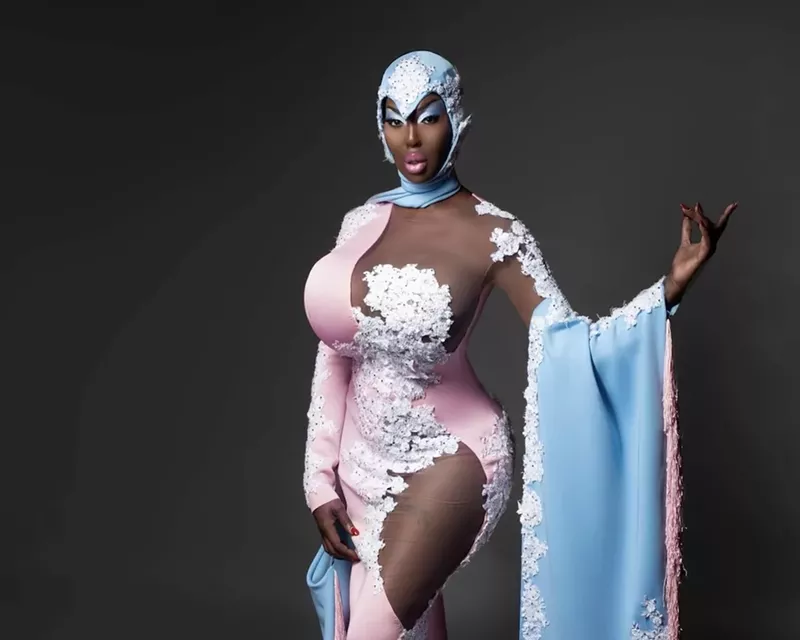 Image: Fantasia Royale Gaga poses in a lace body gown with colors representing the transgender flag.