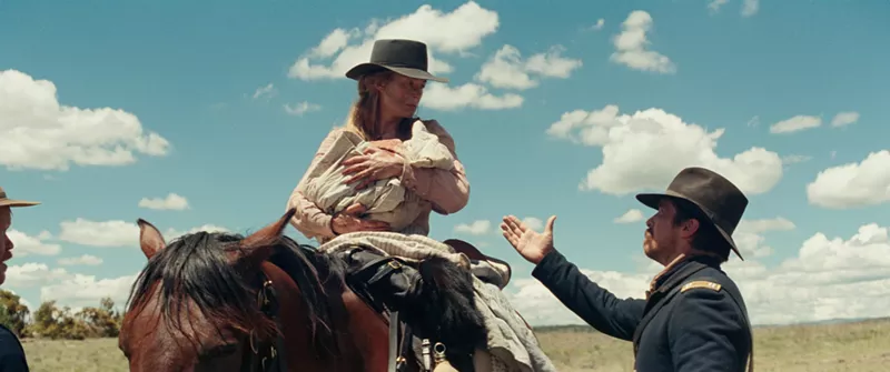 Image: Rosamund Pike (left) plays Rosalee Quaid, the sole survivor of an attack on her 1892 homestead who is aided by Christian Bale's Army Capt. Joseph Blocker in Hostiles.