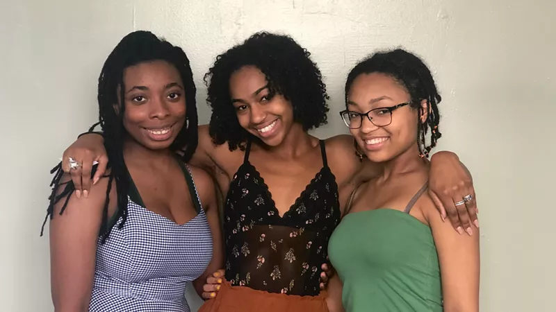 Image: Climate change activists Kaylah Brathwaite, Zeena Abdulkarim, and Anaiah Thomas