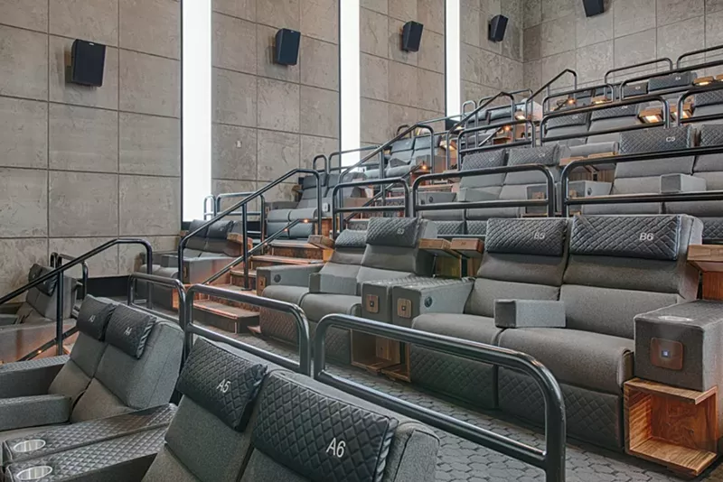 Image: Every customer gets an oversized upholstered reclining seat.