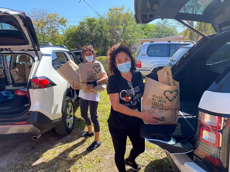 Image: people holding bags