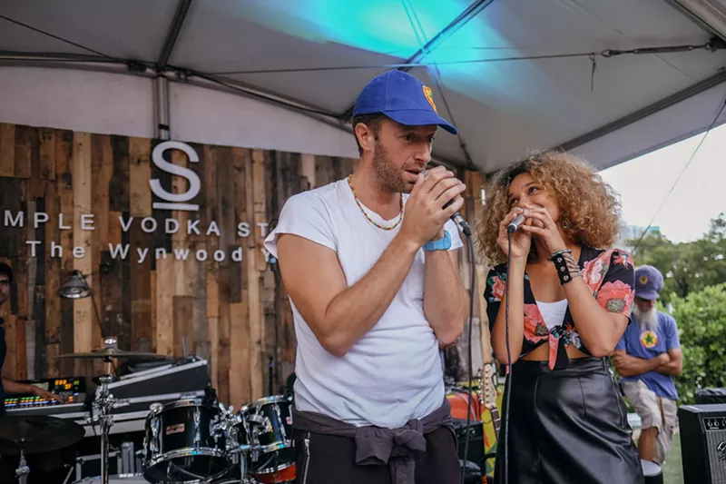 Image: Chris Martin and Izzy Bizu