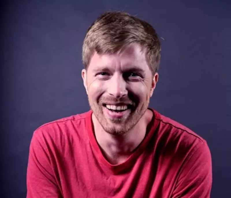 Image: In addition to hosting Stand Up Science, Shane Mauss is the host of the science-themed podcast, Here We Are.