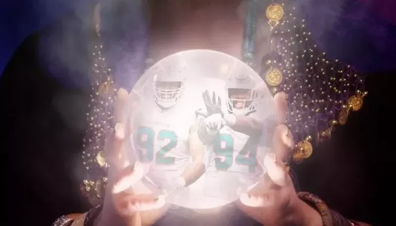Image: A crystal ball, inside which the Miami Dolphins season unfolds.
