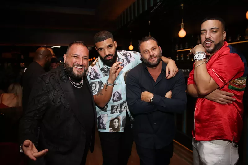 Image: David Einhorn, Drake, David Grutman, and French Montana kibbutz at Papi Steak.