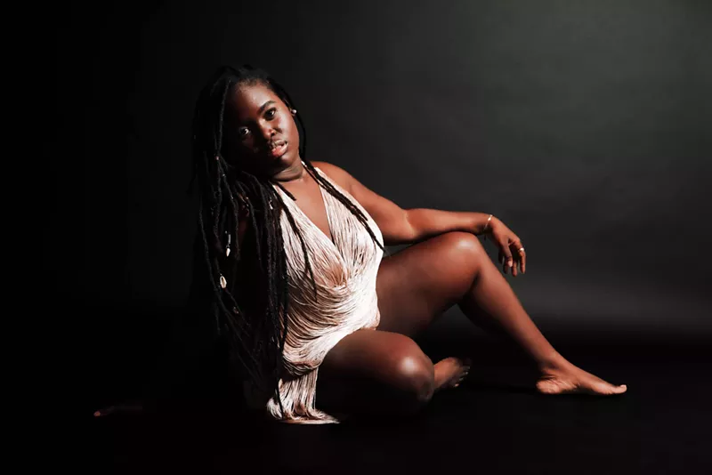 Image: Daymé Arocena poses in a pink dress