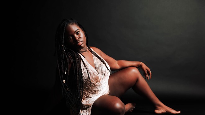 Daymé Arocena poses in a pink dress