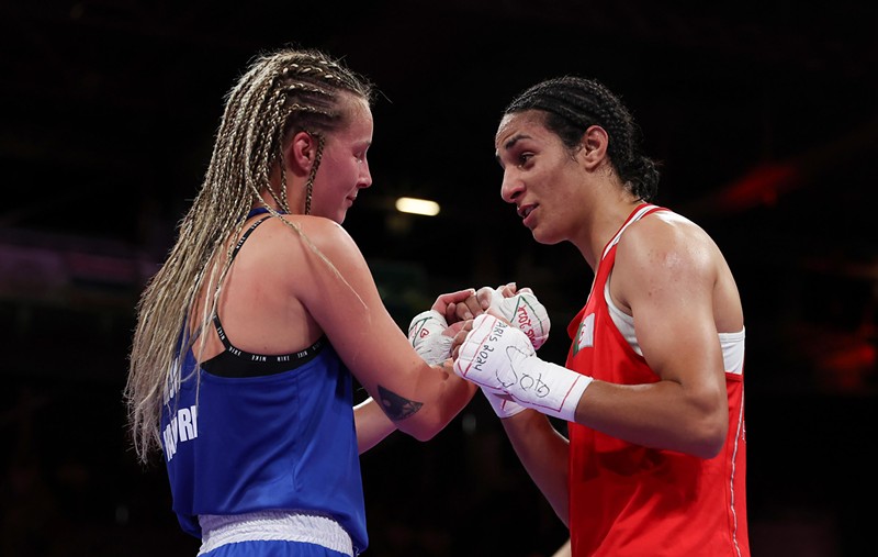 Imane Khelif of Algeria interacts with Anna Luca Hamori of Hungary after Khelif defeated Hamori in the August 3 women's boxing quarterfinals at the 2024 Paris Olympics.